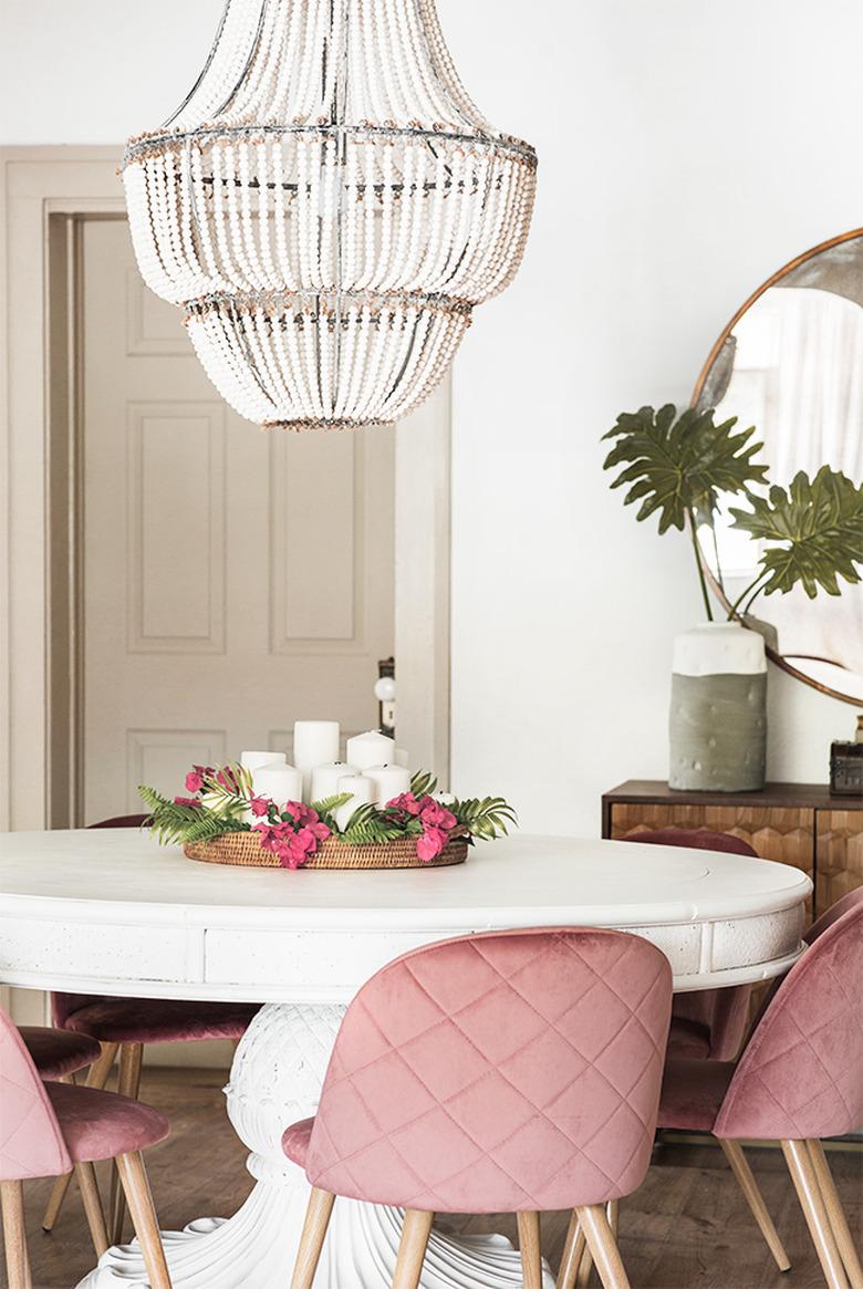 Greige trim and white walls with a round dining table