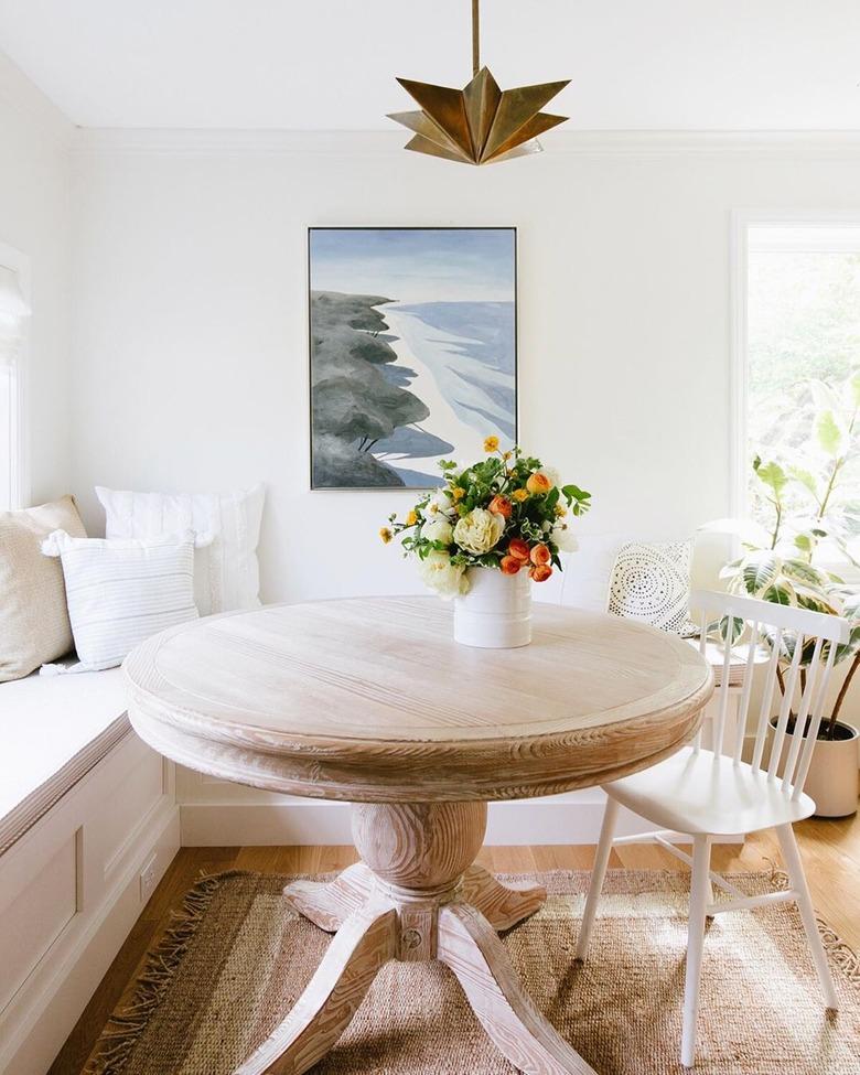 simple neutral dining room table centerpiece with round table