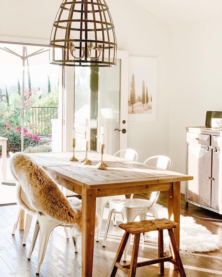 dining room table centerpiece with rustic table and metal chairs