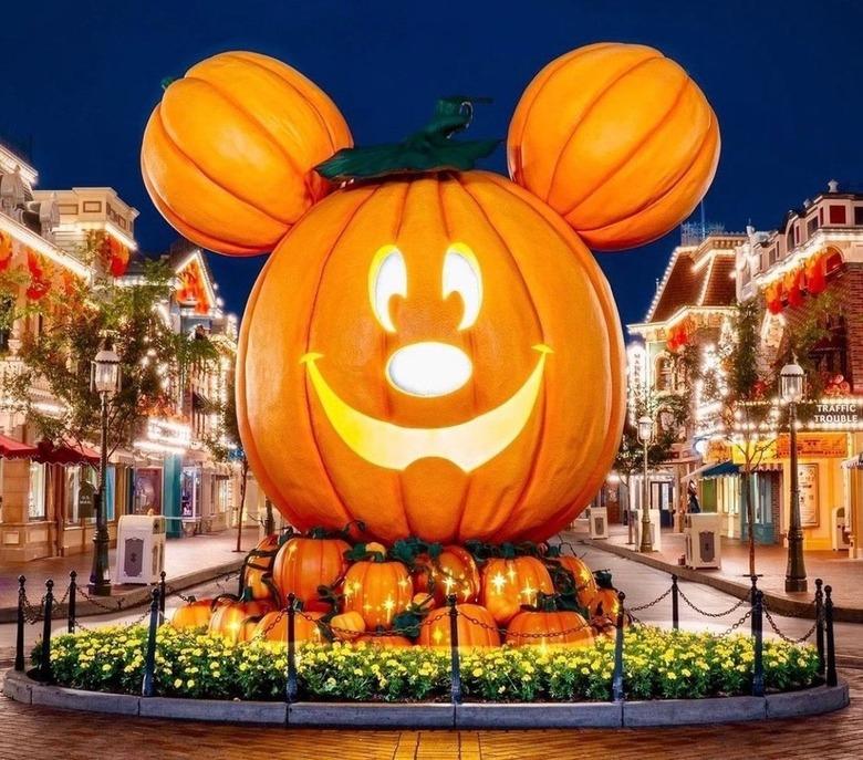 Disneyland giant Mickey Mouse-shaped jack-o-lantern in the middle of the park.