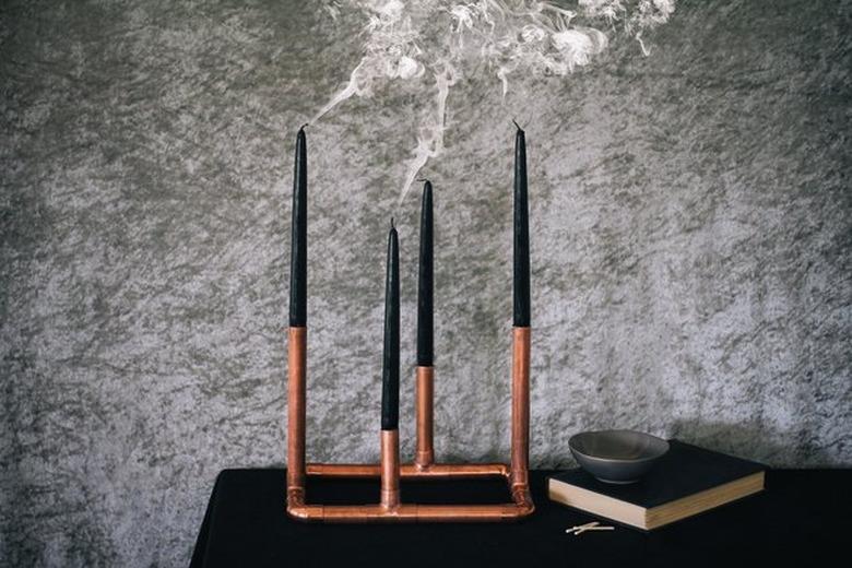 DIY fall decor idea with copper candelabra with black tapers