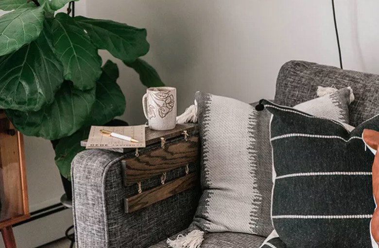 Couch with wood armrest table