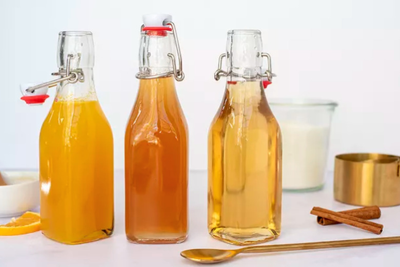 Homemade simple syrups in glass bottles