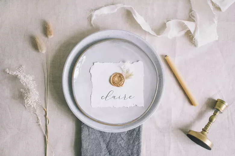 Wax seal place cards on table