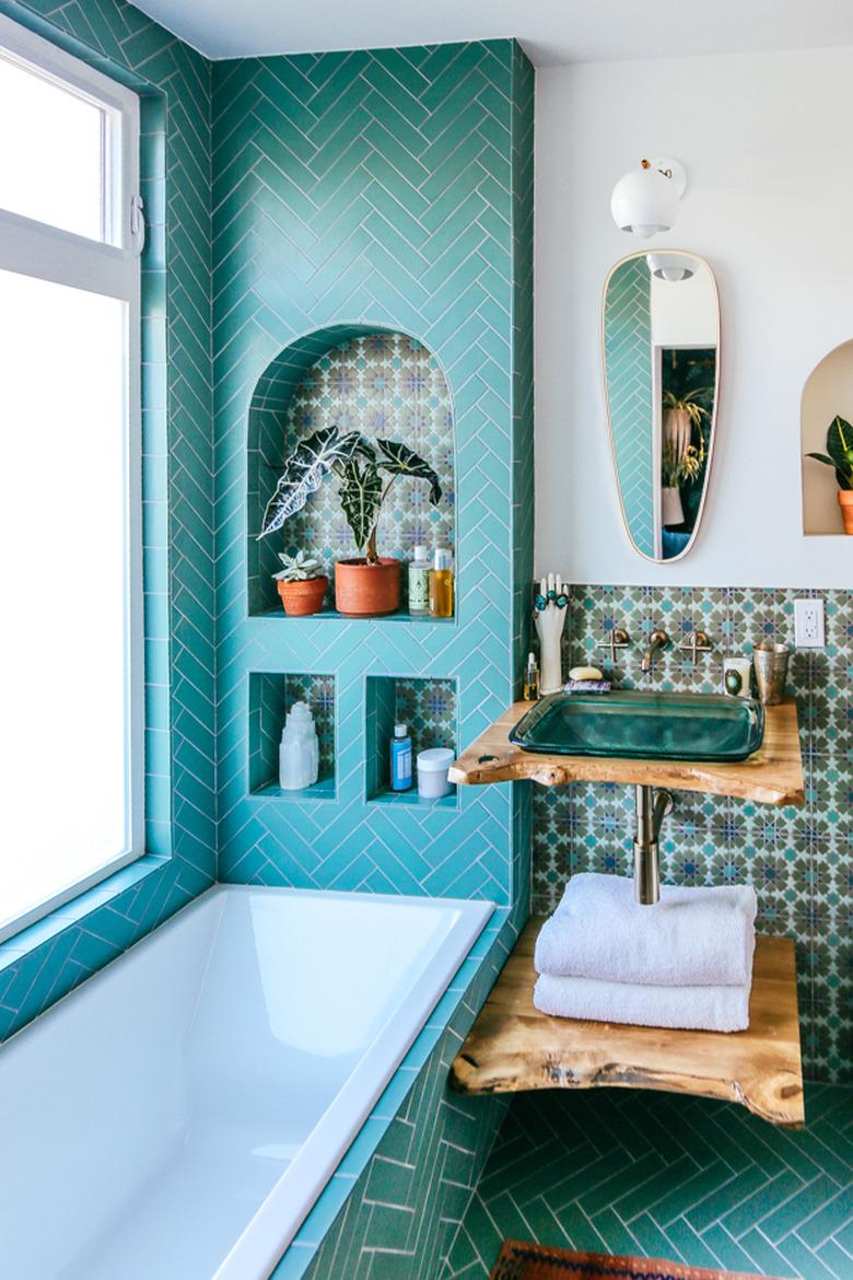 glass drop in bathroom sink with reclaimed wood vanity