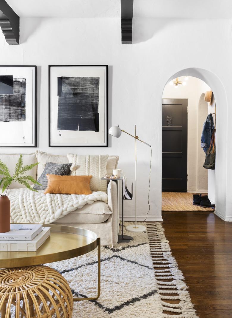 living room with thick woven throw on the couch