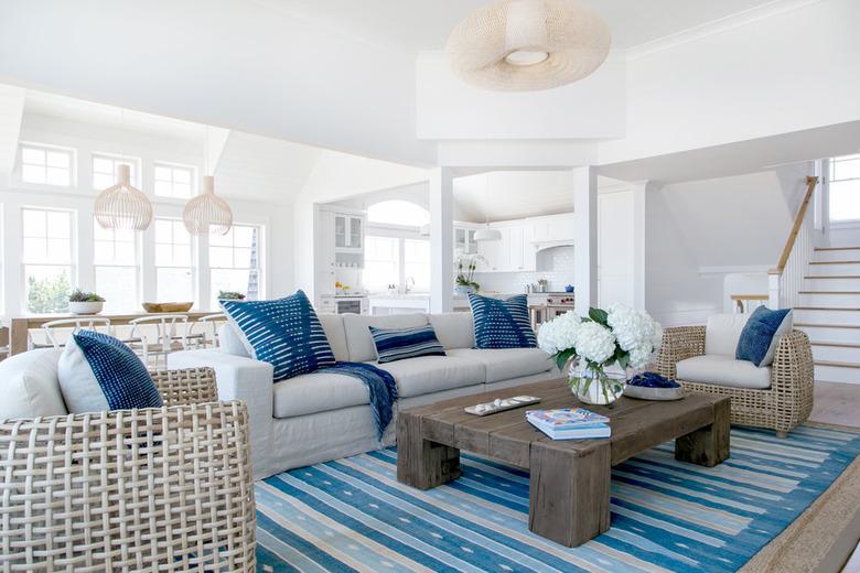 jute family room carpet ideas with layered blue striped rug