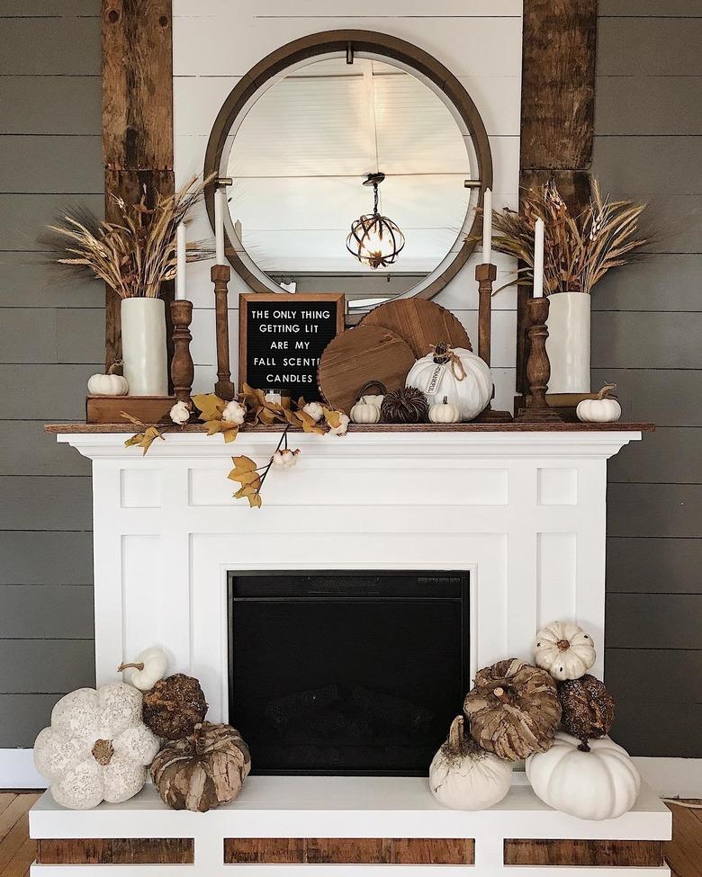 earth-toned hearth display featuring farmhouse fall decor