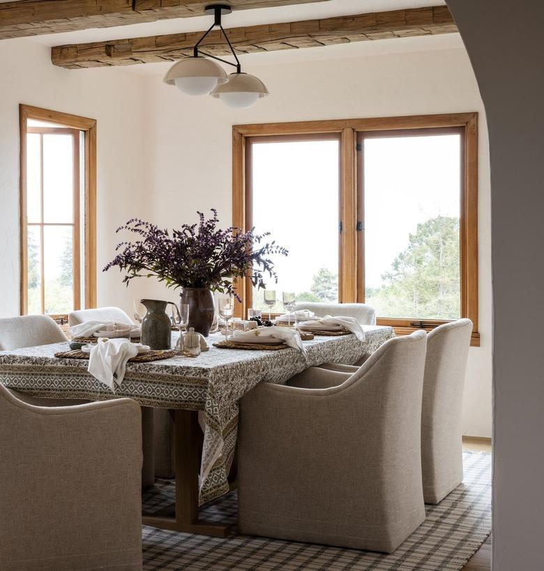 tonal dining room with lavender flowers