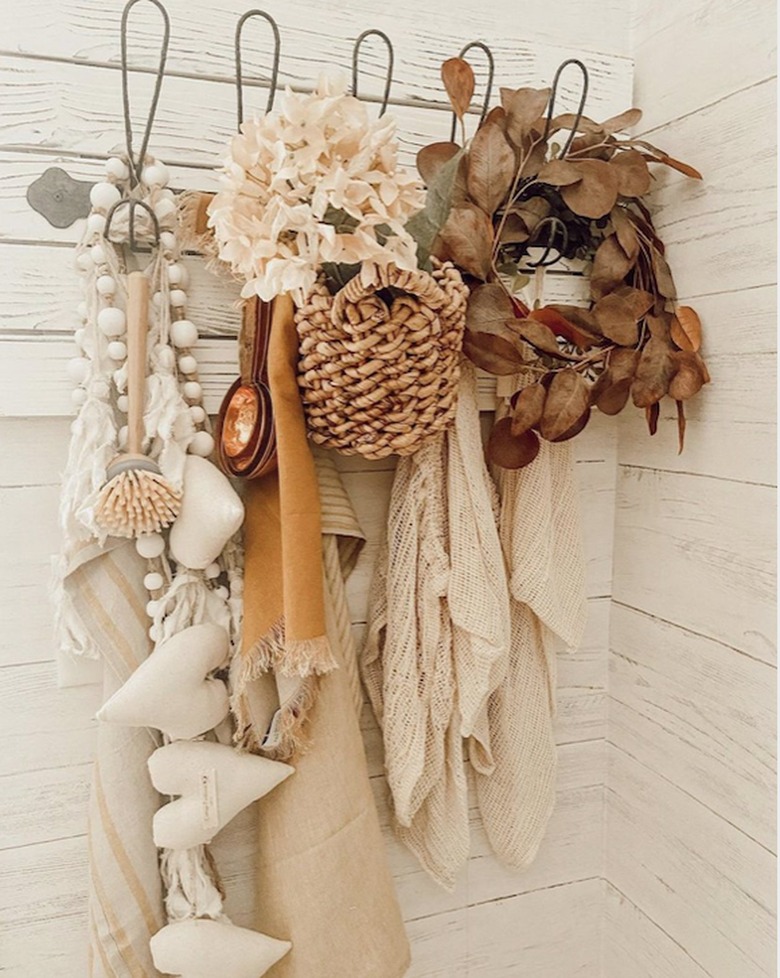 coat rack with fall decor