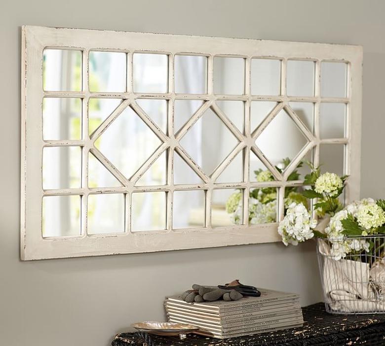 antique farmhouse mirror with trellis design and distressed finish