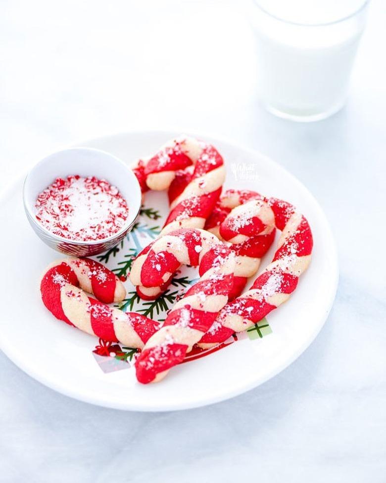 candy cane sugar cookies with glass of milk