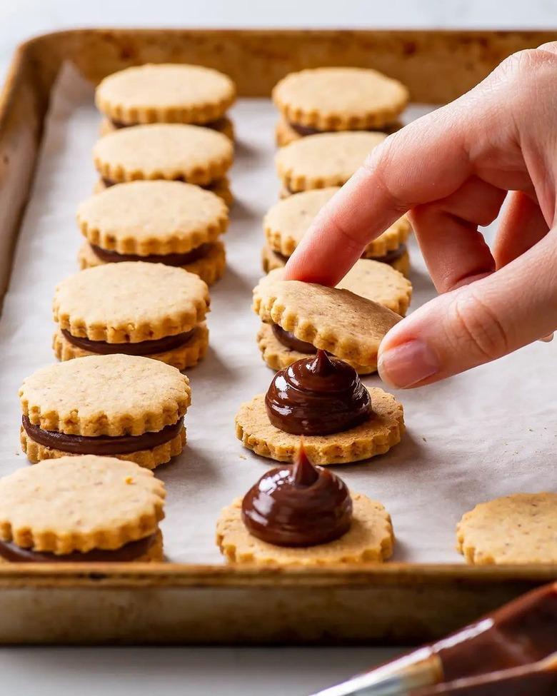 The Loopy Whisk's Hazelnut Shortbread Sandwich Cookies With Milk Chocolate Ganache