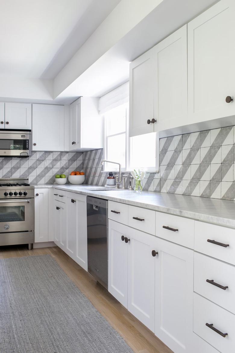 Gray Backsplash Kitchen Idea by Chango & Co.