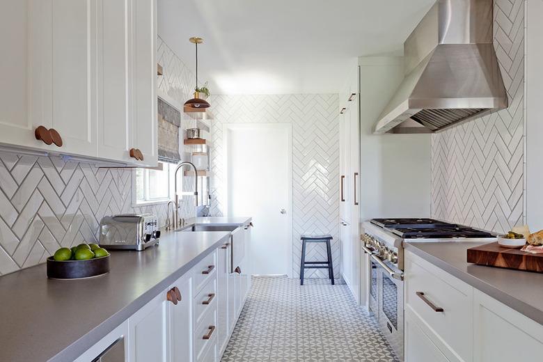 gray & white kitchen with gray patterned flooring