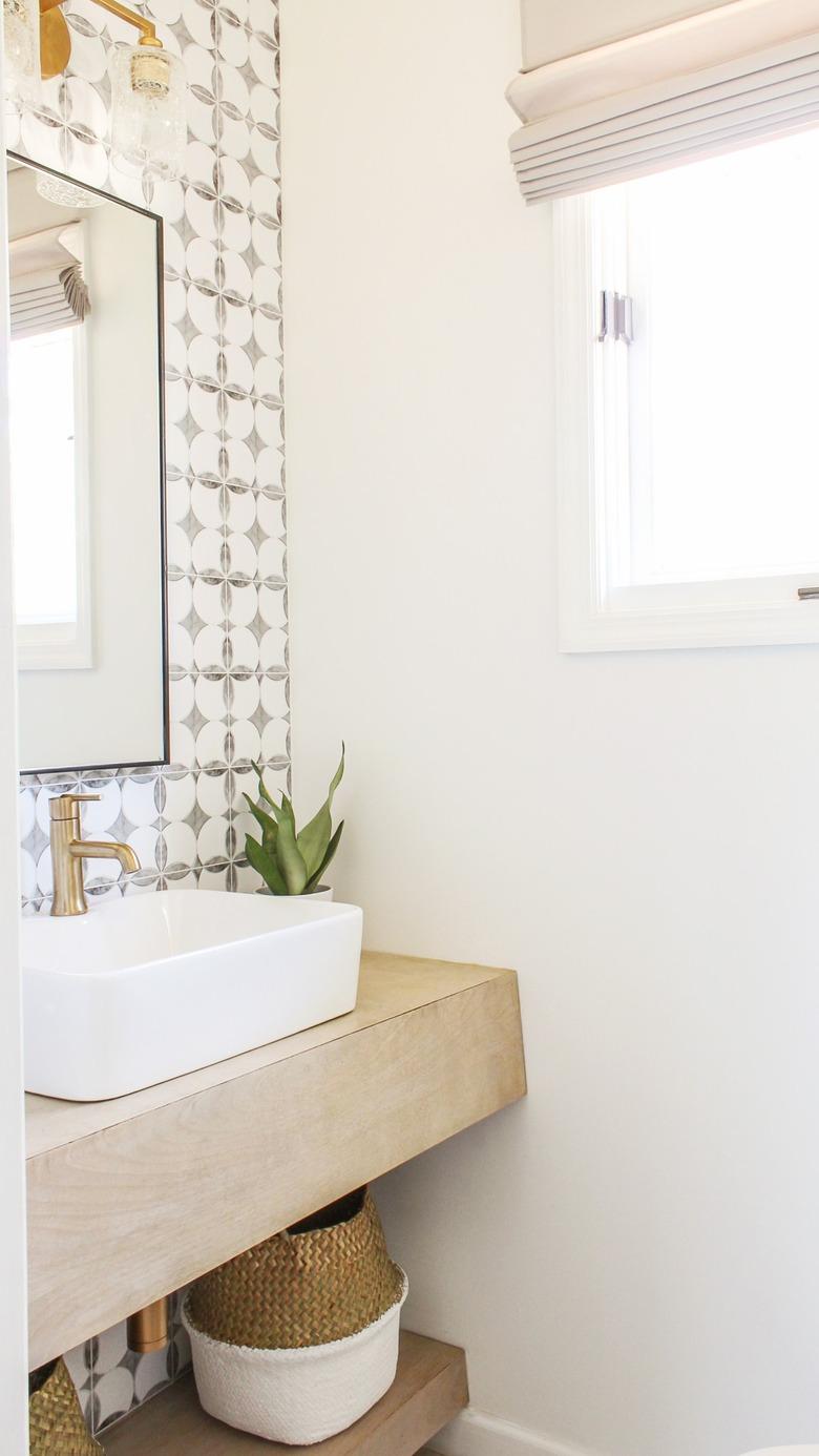 half bathroom idea with brass fixtures and vessel sink