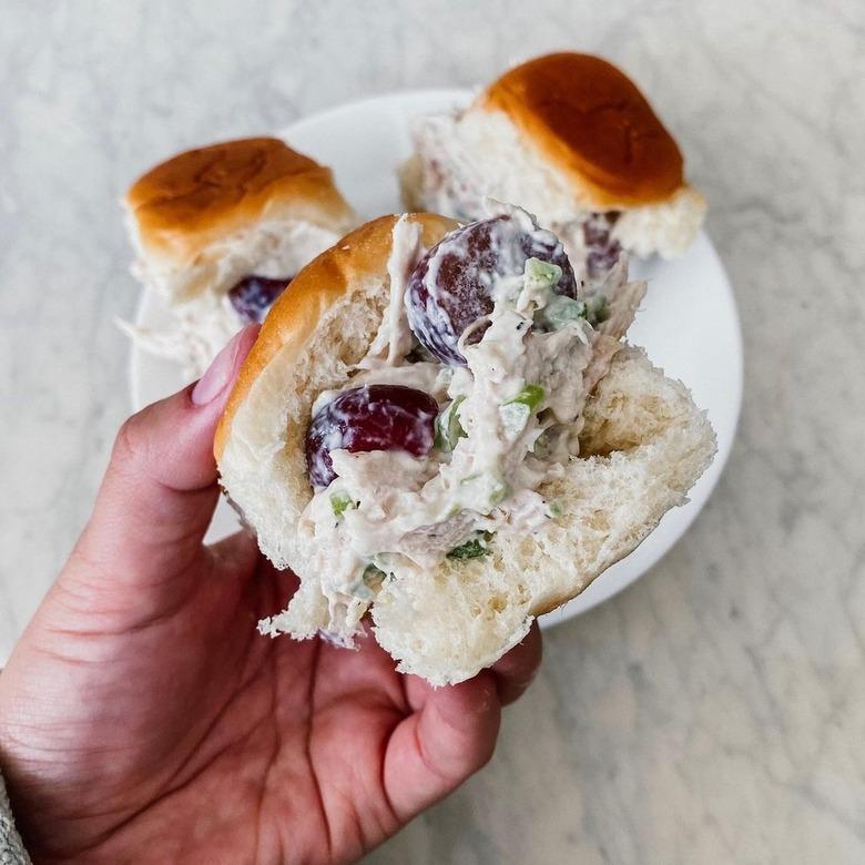 A chicken salad sandwich on a hawaiian roll