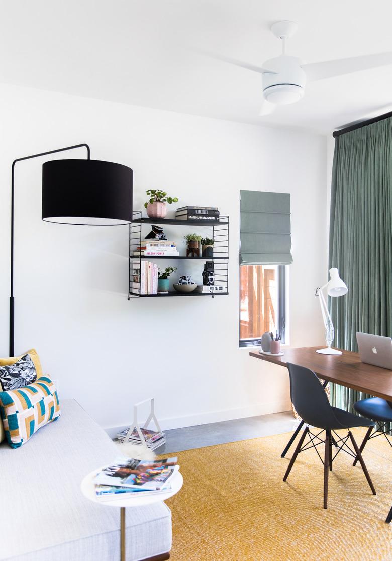 modern black floor lamp in modern white office