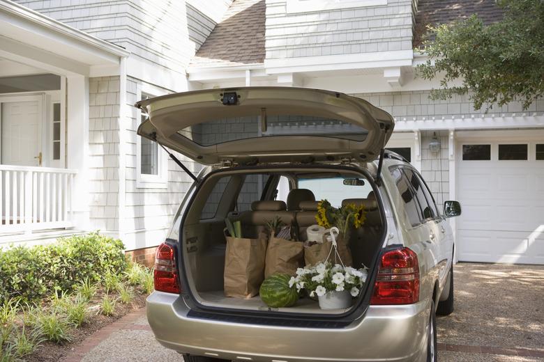 Mini-van with groceries and flowers