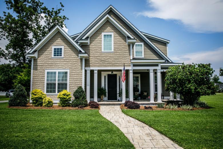 Brown two story all American home