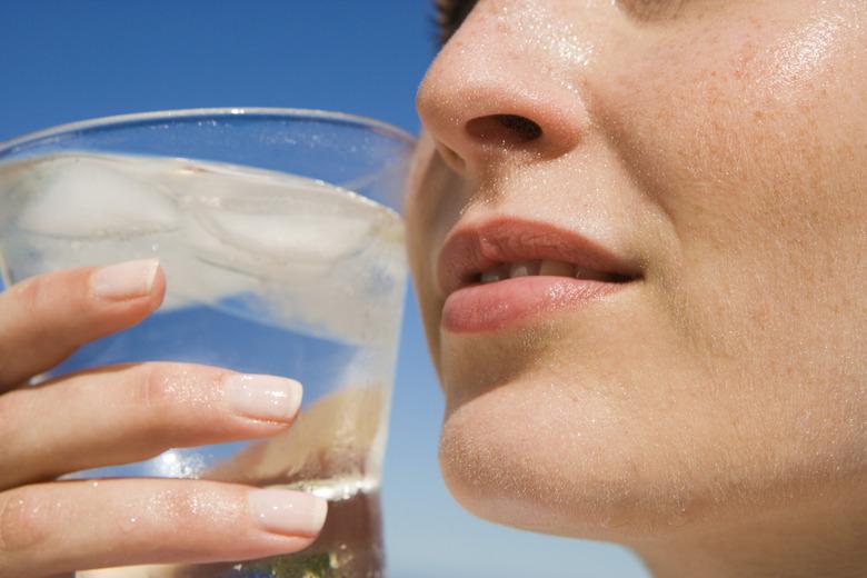 Woman drinking glass of water