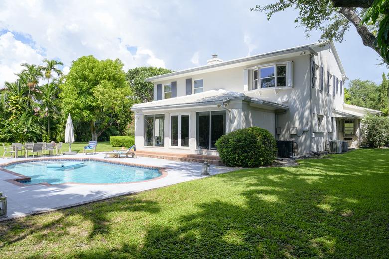 Modern two-story home in Miami with yard and swimming pool