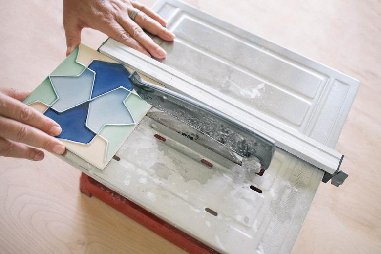 Cutting ceramic tile with wet saw