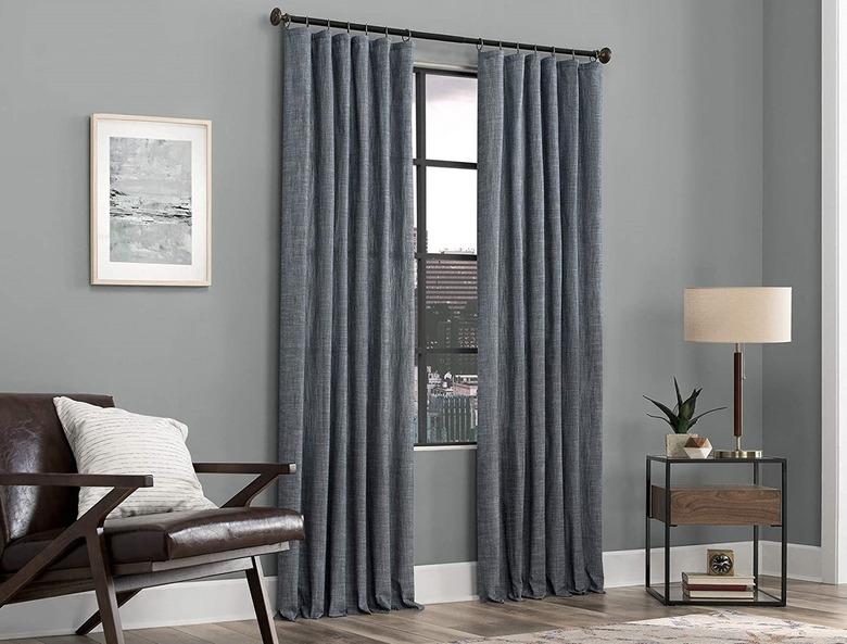 Scott Living Delton Stonewashed Cotton Semi-Sheer Ring Top Curtain Panels in Gray Living Room With Brown and Beige Accents