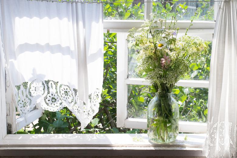 Wild flowers on windowsill.