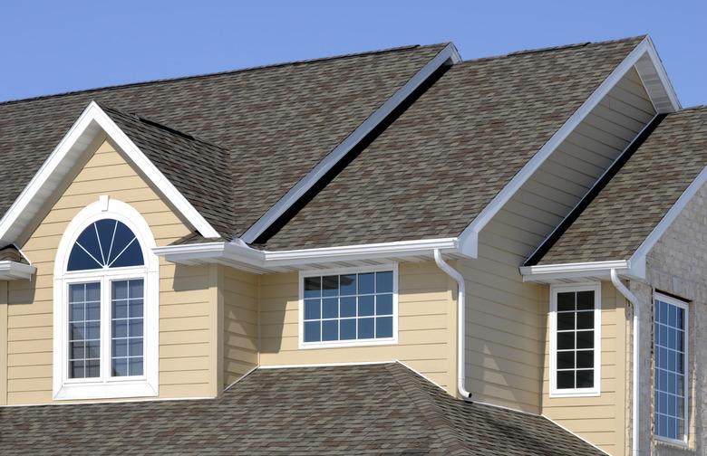 New Residential House; Architectural Asphalt Shingle Roof, Vinyl Siding, Gables