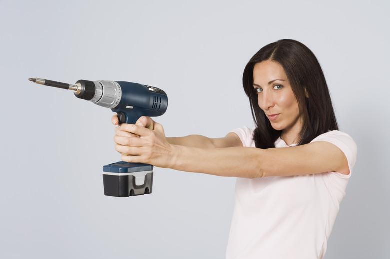 Woman with power drill