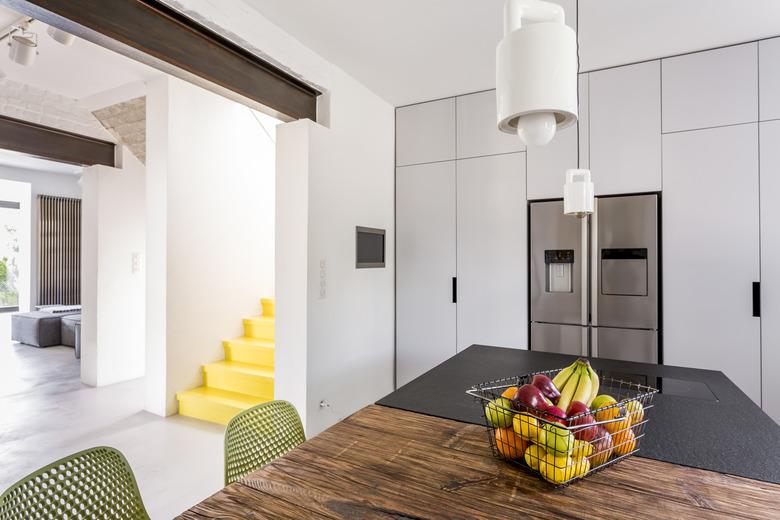 White scandi kitchen with tables