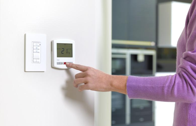 Young woman changing heating