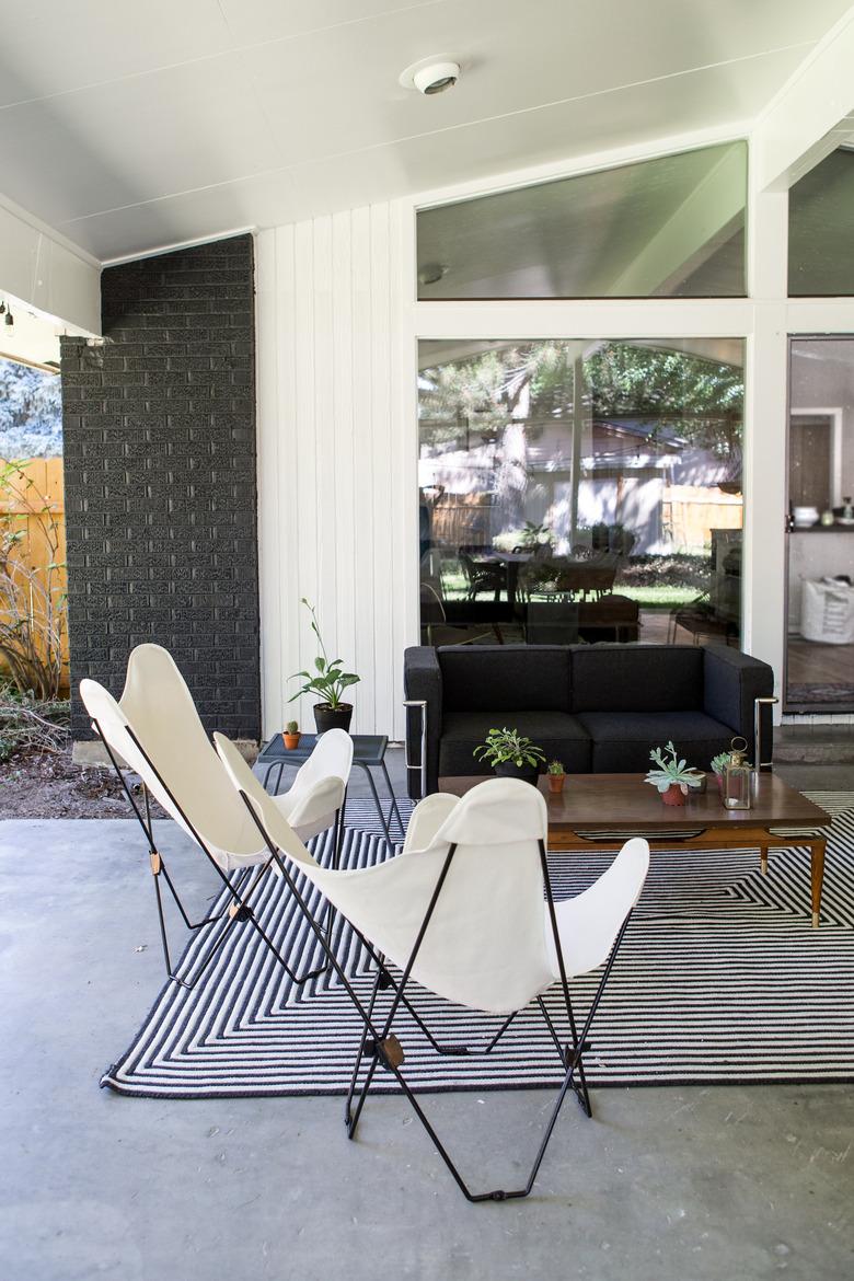 Kirsten Grove outdoor patio with sofa and butterfly chairs