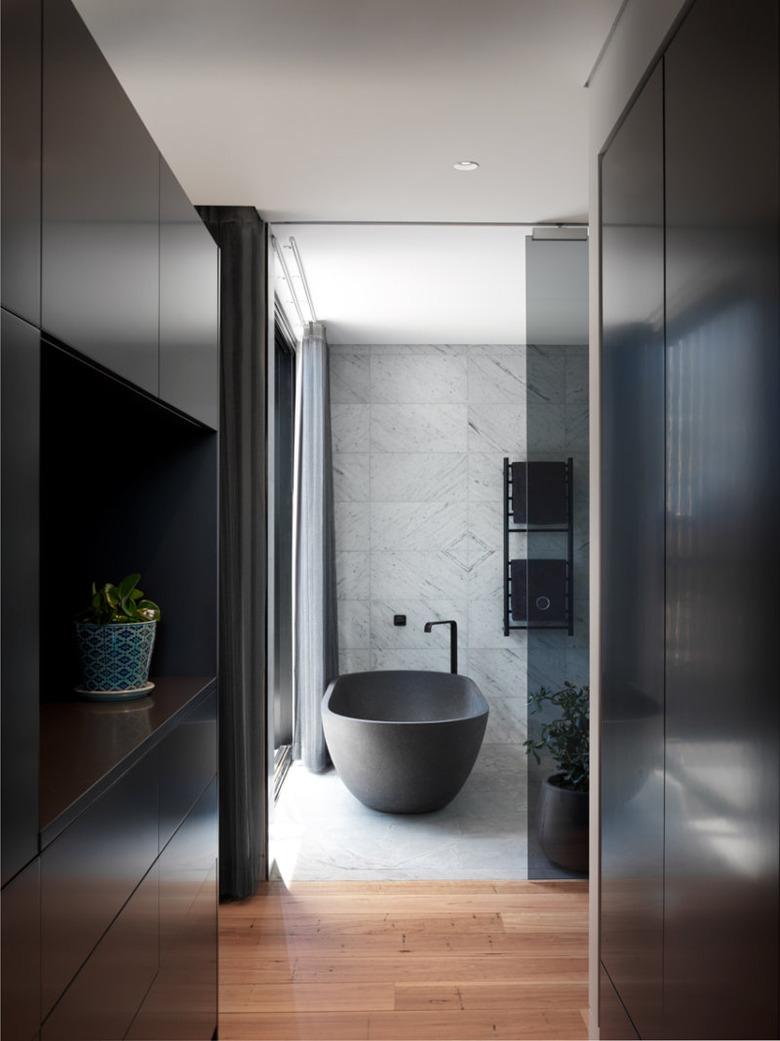 dark bathroom with black bathroom fittings