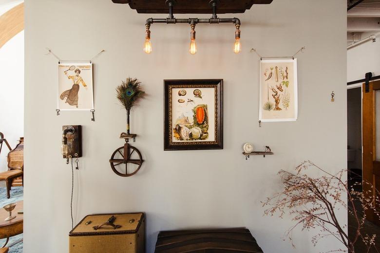 industrial farmhouse decor with vintage art and industrial lightbulbs