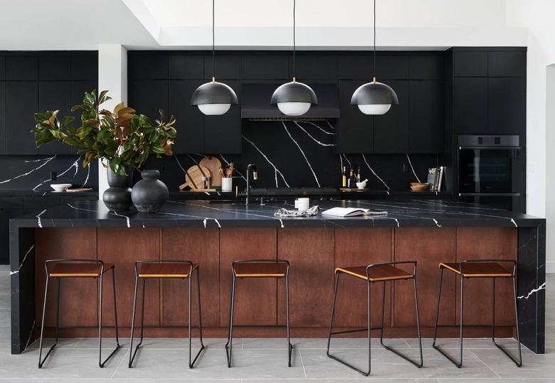 black kitchen backsplash and countertops