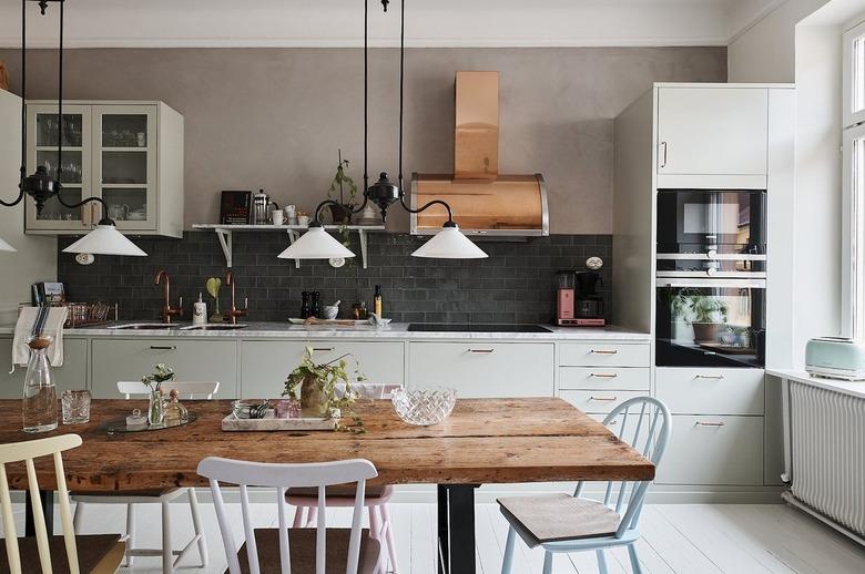 Scandinavian kitchen with black backsplash