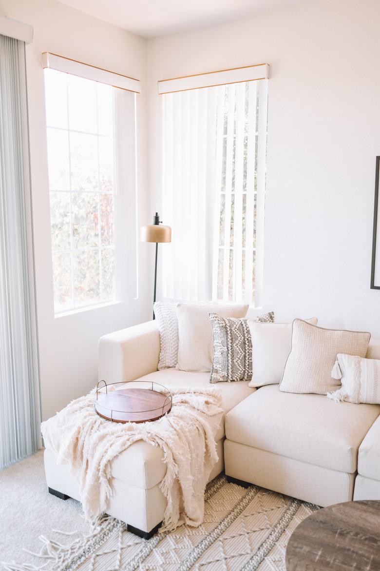 ivory color idea in family room with ivory sofa and throw pillows