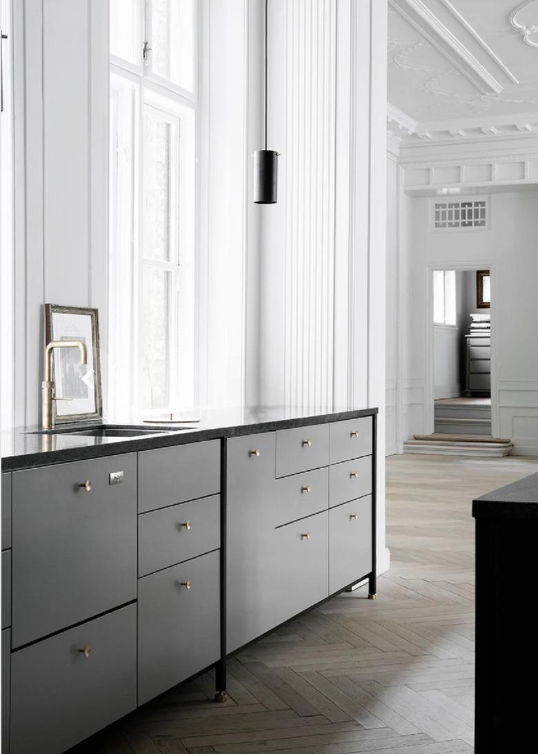 kitchen with gray cabinets and gray wood floors