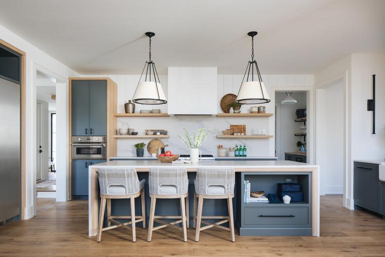 kitchen with gray cabinets and natural wood floors