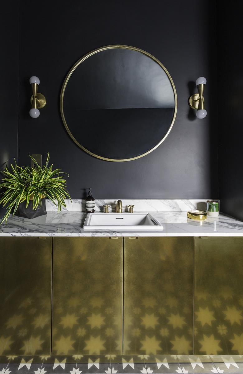 dark blue master bathroom with gold master bathroom vanity