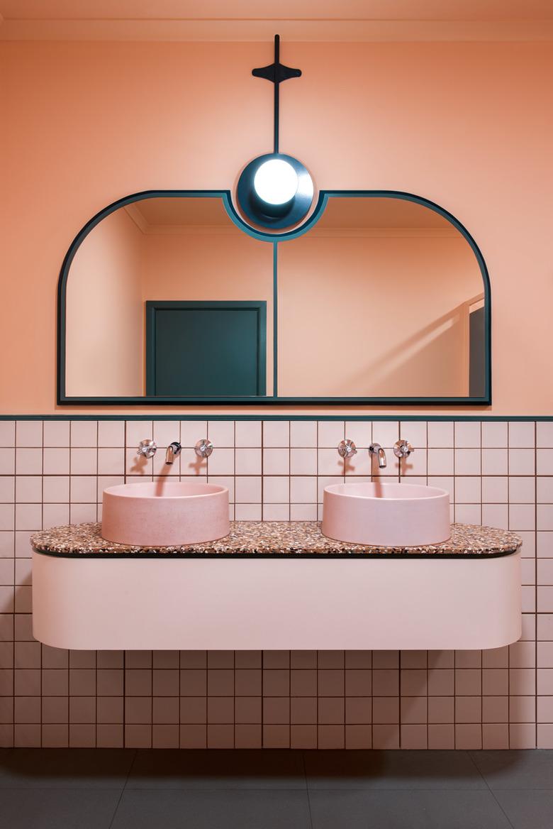 pink floating master bathroom vanity in modern bathroom