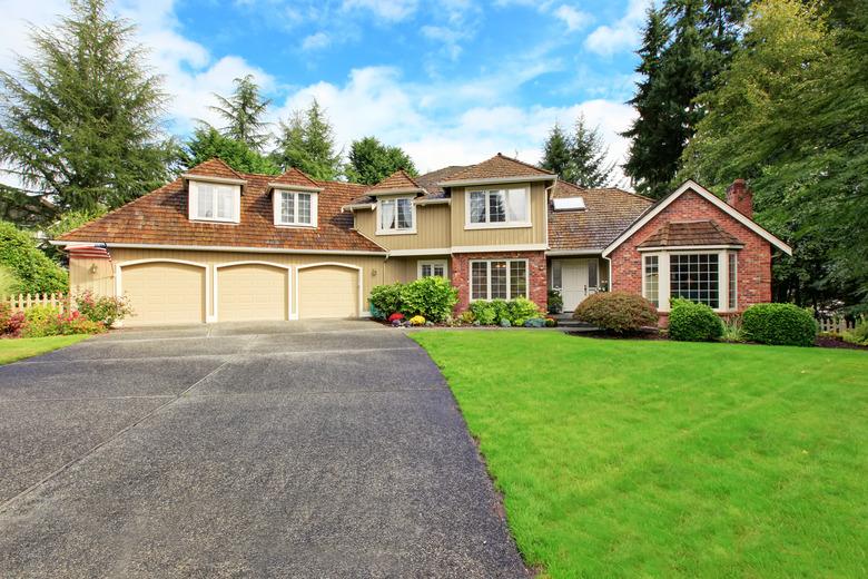 American real estate. Luxury house exterior with brick trim