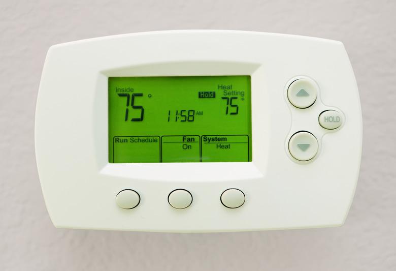 Programmable Digital Thermostat Showing 75 Degrees In Fahrenheit