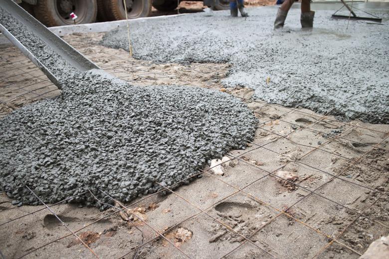 Concrete consists of cement, rocks and other ingredients mixed with water.