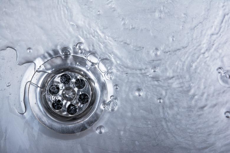 sink, drain and flowing water for background