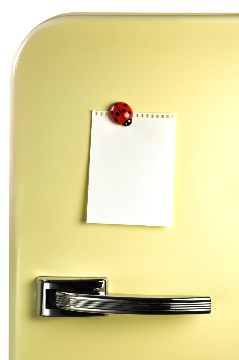 Paper on fridge with magnet