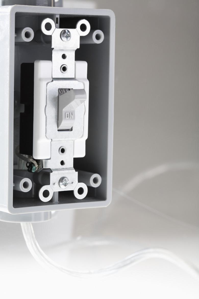 Light switch with missing face plate