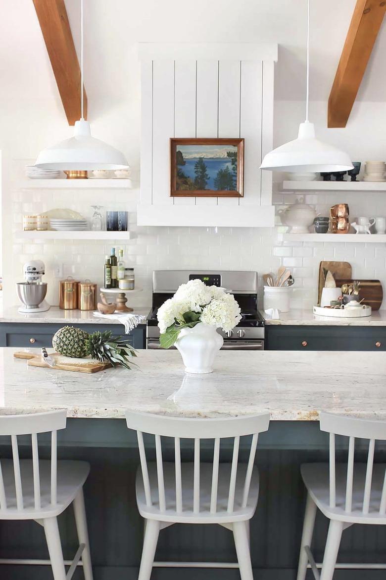 white granite countertop in white vintage-inspired kitchen